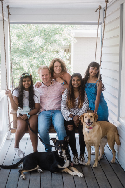 The Le Peau family on their porch swing